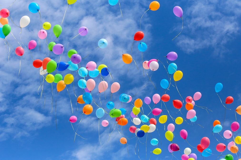 Helium balloons in the sky